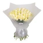 White rose bouquet with wrapping and ribbon