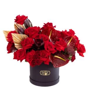 The One red flower box with golden palm leaves