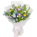 Berlin bouquet of freesias, purple hyacinths and Green Trick