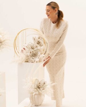 Celestial Halo arrangement with gold ring, magnolia-inspired flowers and pearls