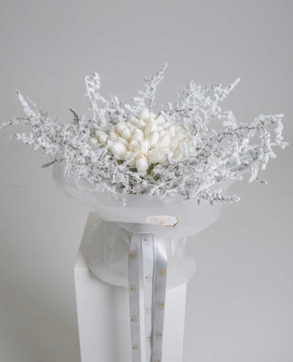 Crystal White Bouquet with white tulips, frosted foliage and crystal accents