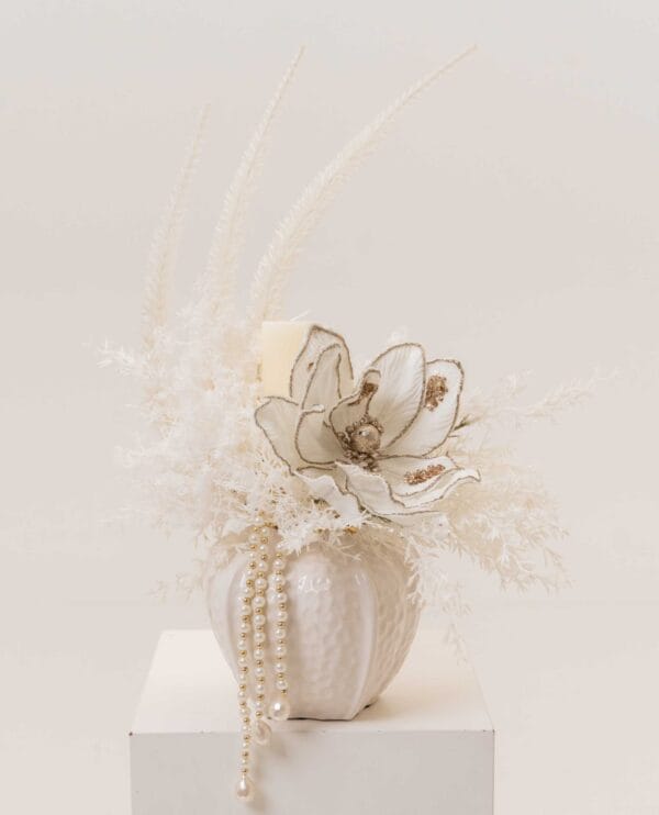 Opaline Grace magnolia-inspired arrangement with pearls in a ceramic vase