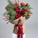 Majestic Red Bouquet with red roses, amaryllis, ilex berries and pine