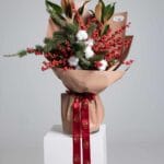 Majestic Red Cotton Bouquet with cotton, magnolia leaves, ilex berries and pine