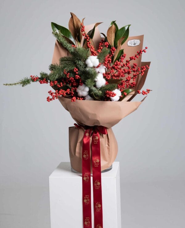 Majestic Red Cotton Bouquet with cotton, magnolia leaves, ilex berries and pine