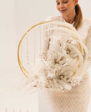 Celestial Halo arrangement with gold ring, magnolia-inspired flowers and pearls